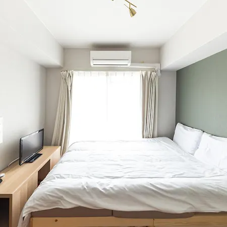 Ferienwohnung 702 道頓堀側のお部屋 中心地へのアクセス抜群 ダブルベッド1台 お布団1枚